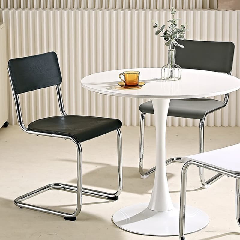Cantilever Stable Armless Chair with Foot Pads, Open Back and Metal Base in a Modern Style thumbnail 8