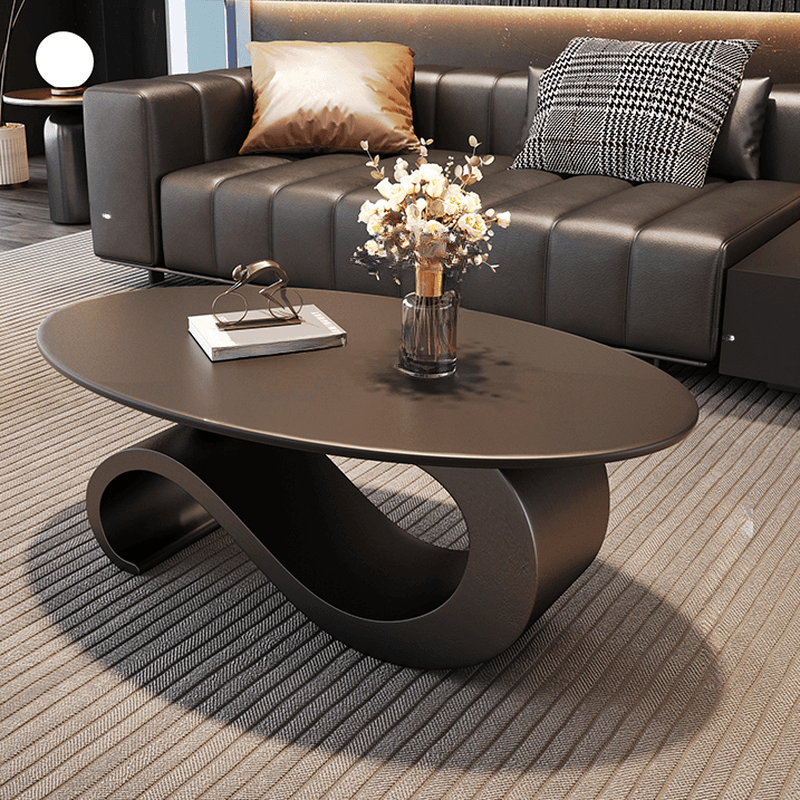 Minimalist Elliptical Rock Nesting Accent Table with Abstract Base thumbnail 1